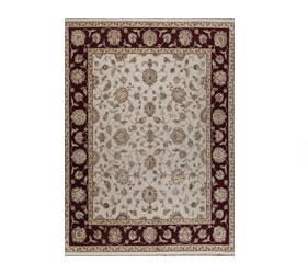 Zeagler rug with a beige background and black borders with floral design 